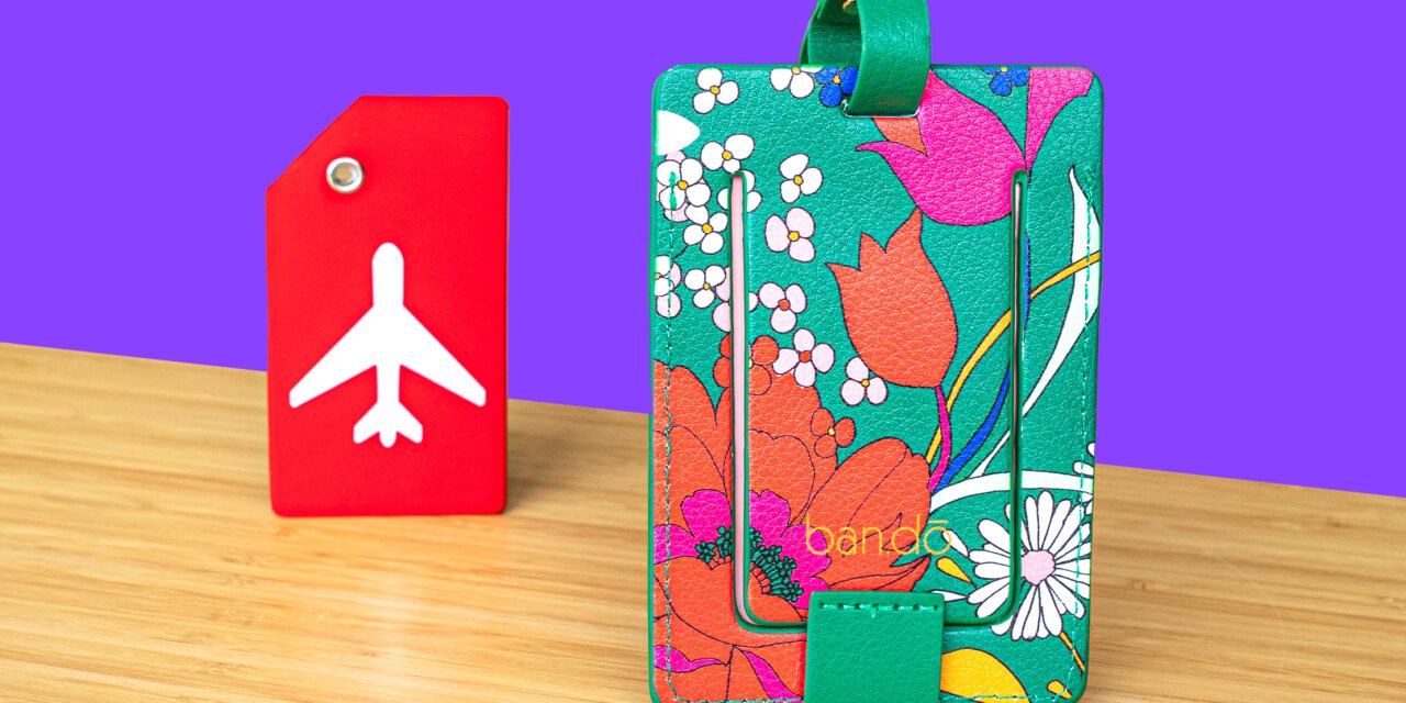 How are luggage tags designed for durability and legibility while meeting industry standards?