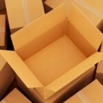 How are corrugated boxes customized for specific applications, such as branding, size, or special coatings?